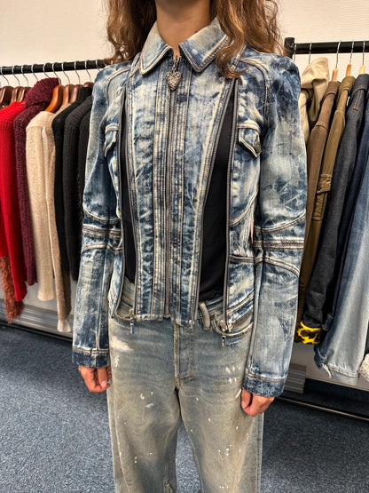 Just Cavalli sky blue denim jacket with multiple zippers and unique print design.