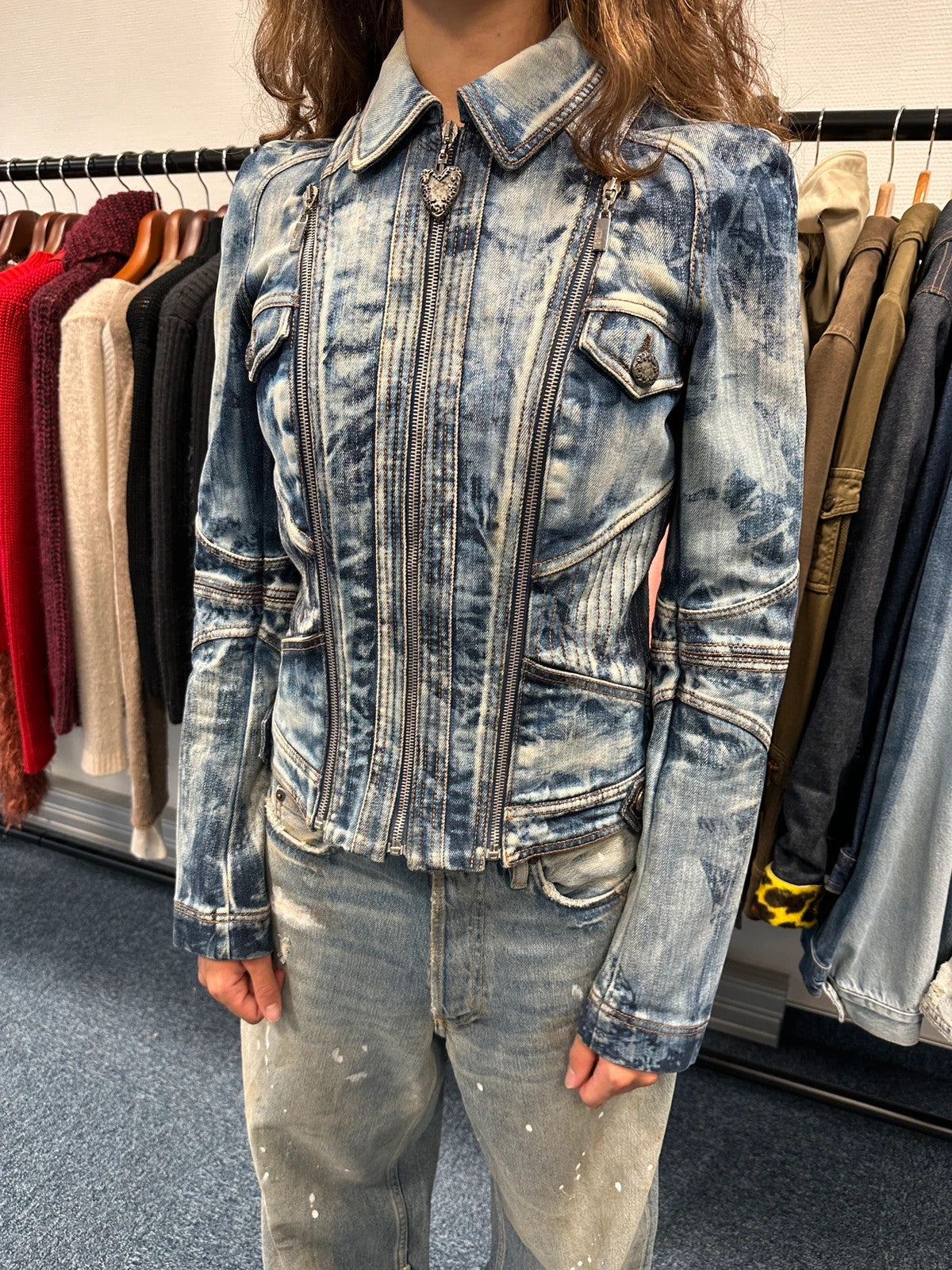 Just Cavalli sky blue denim jacket with multiple zippers and unique print design.