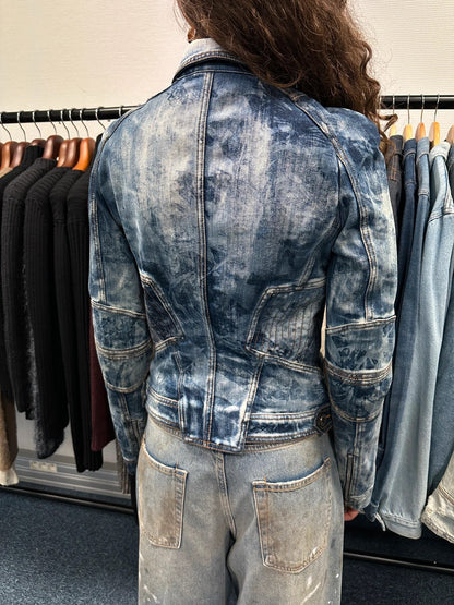 Just Cavalli sky blue denim jacket with multiple zippers and unique print design.