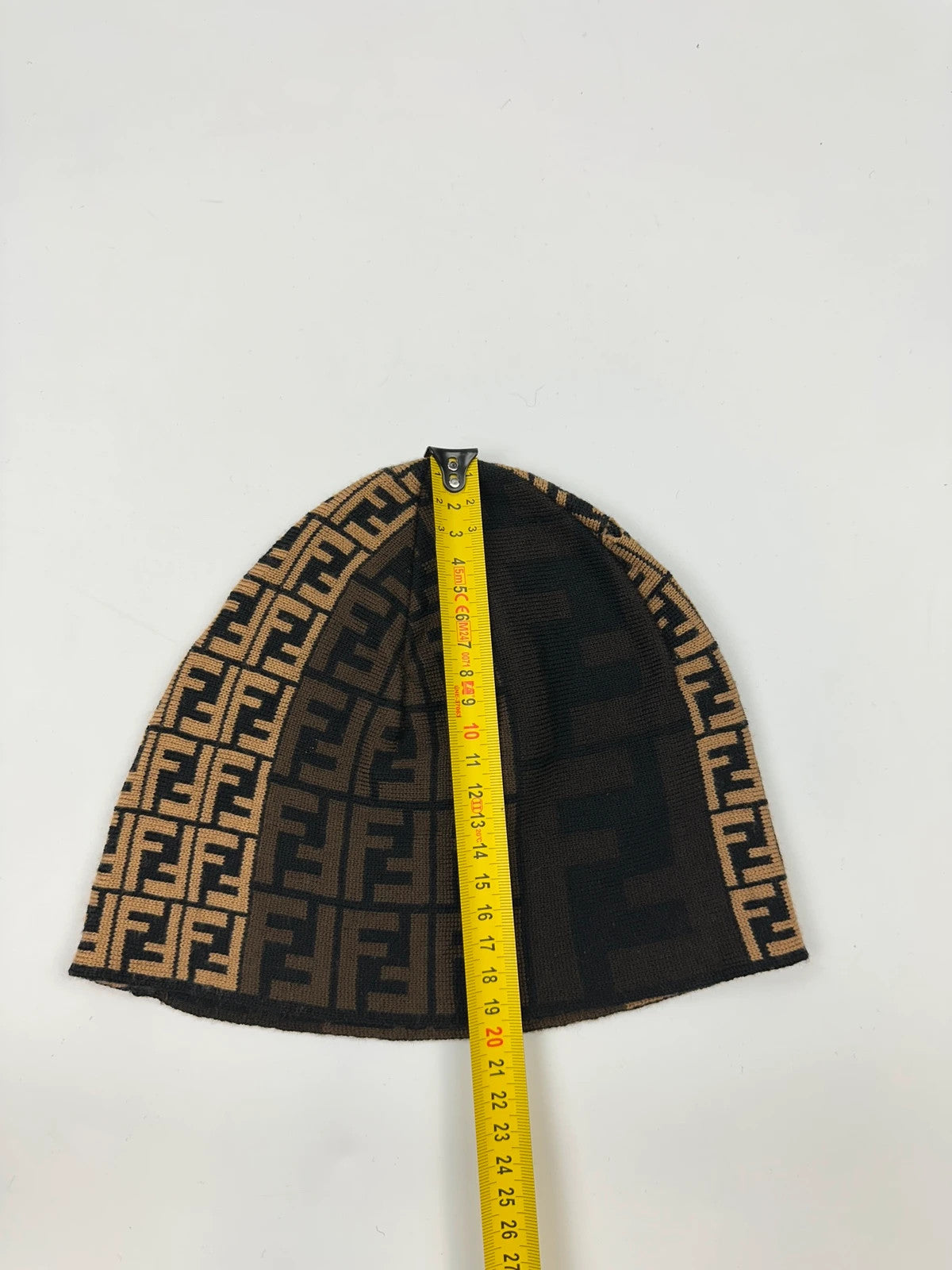 Fendi beige brown wool beanie with FF monogram pattern and vintage design.