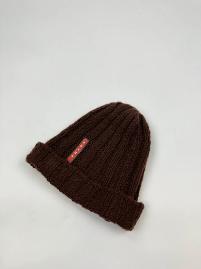 Prada brown wool knitted beanie with red logo tab from FW2014 collection.