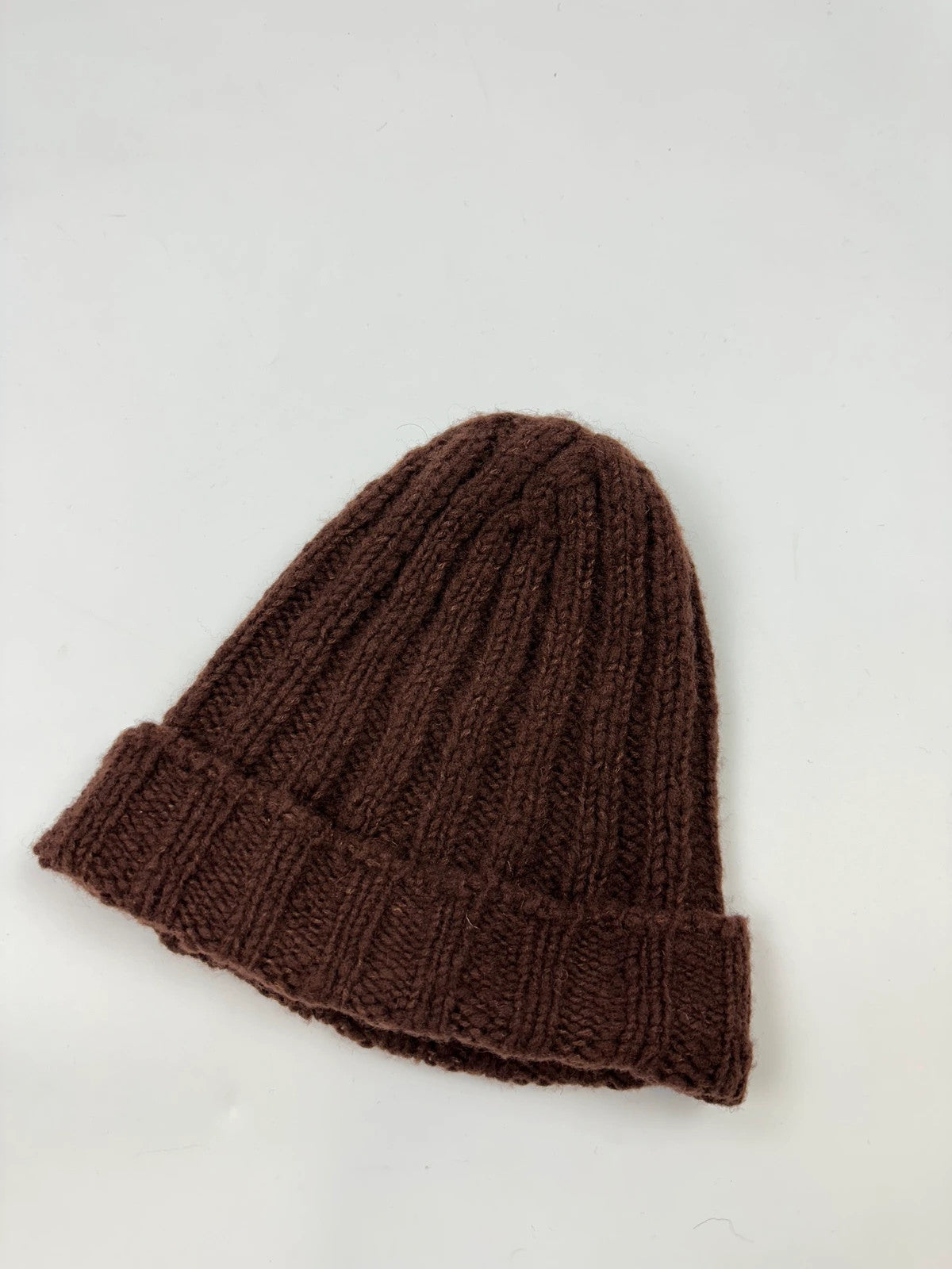 Prada brown wool knitted beanie with red logo tab from FW2014 collection.