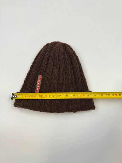 Prada brown wool knitted beanie with red logo tab from FW2014 collection.