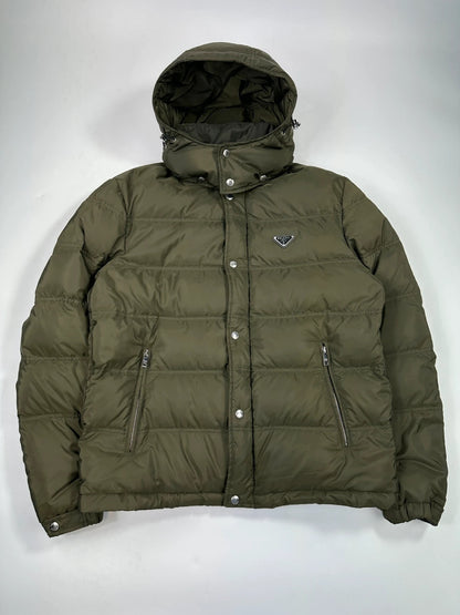 Prada khaki puffer down jacket with hood, featuring triangle logo and luxurious material.