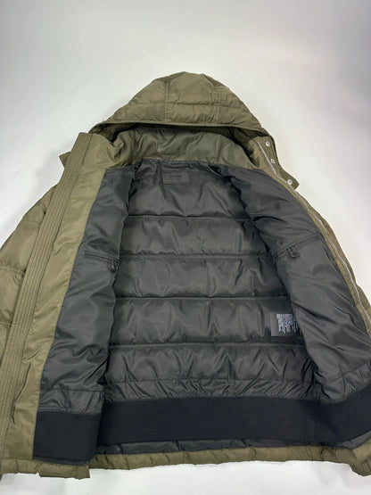 Prada khaki puffer down jacket with hood, featuring triangle logo and luxurious material.