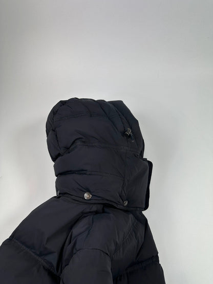 Prada dark navy hooded puffer jacket with triangle logo and vintage 2000s design.