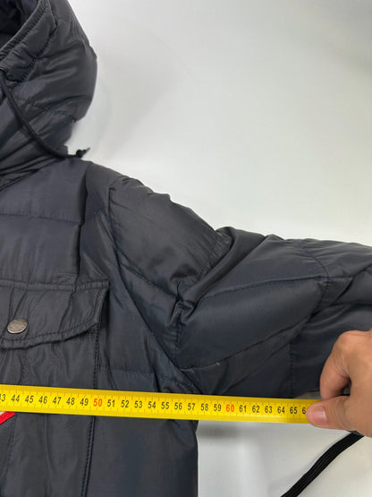 Moncler navy blue puffer jacket with French logo and hood, down-filled material.