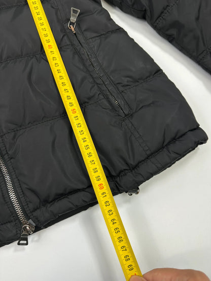 Prada black fitted nylon down puffer jacket with hood and logo detail.
