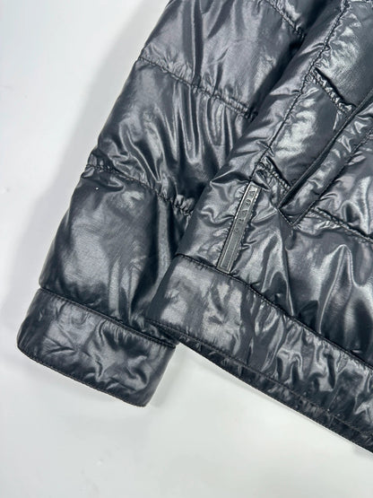 Prada black puffer jacket with shirt collar and Ripstop nylon fabric.