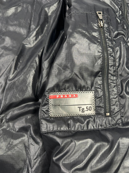 Prada black puffer jacket with shirt collar and Ripstop nylon fabric.