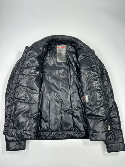 Prada black puffer jacket with shirt collar and Ripstop nylon fabric.