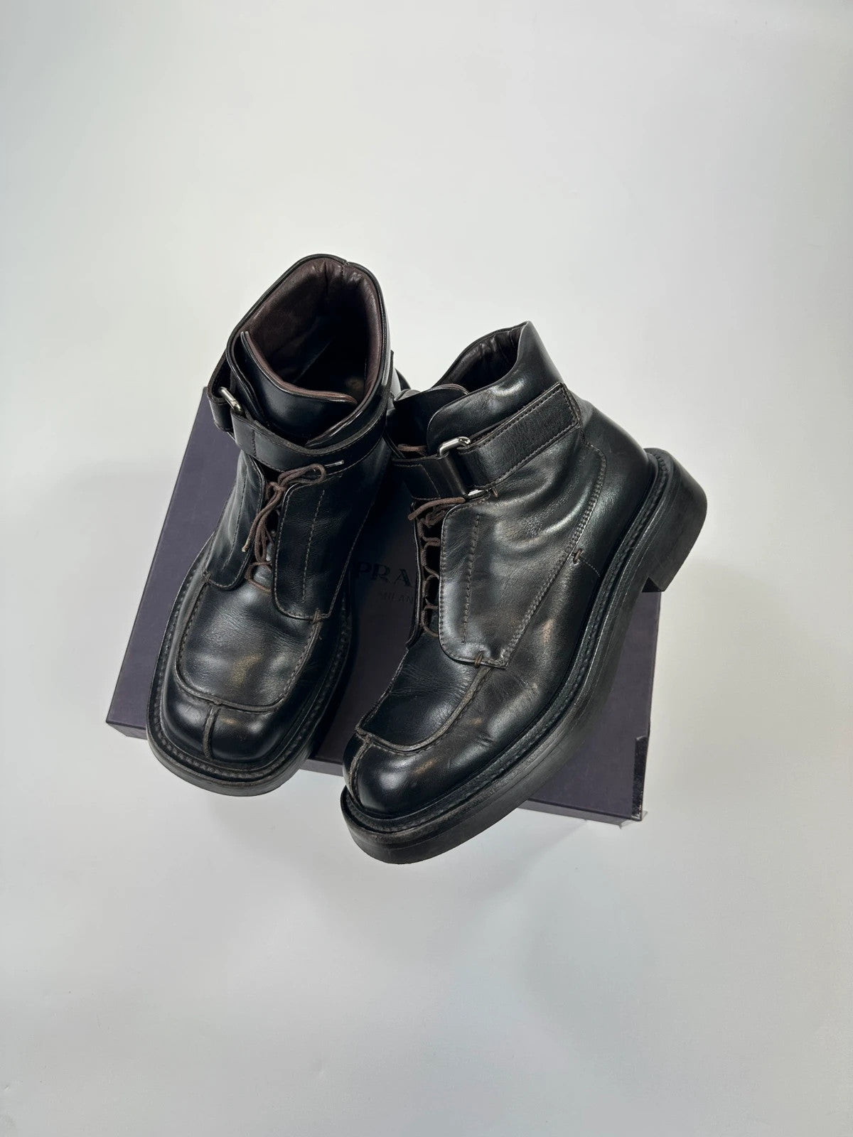 Prada black leather ankle boots with laces and Velcro, vintage 1999 collection.