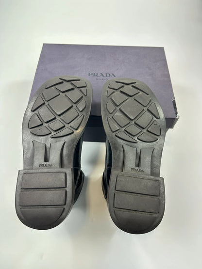 Prada black leather ankle boots with laces and Velcro, vintage 1999 collection.