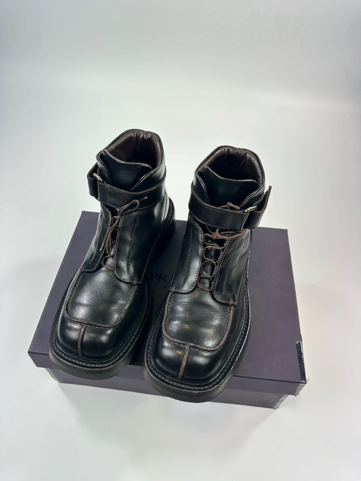 Prada black leather ankle boots with laces and Velcro, vintage 1999 collection.
