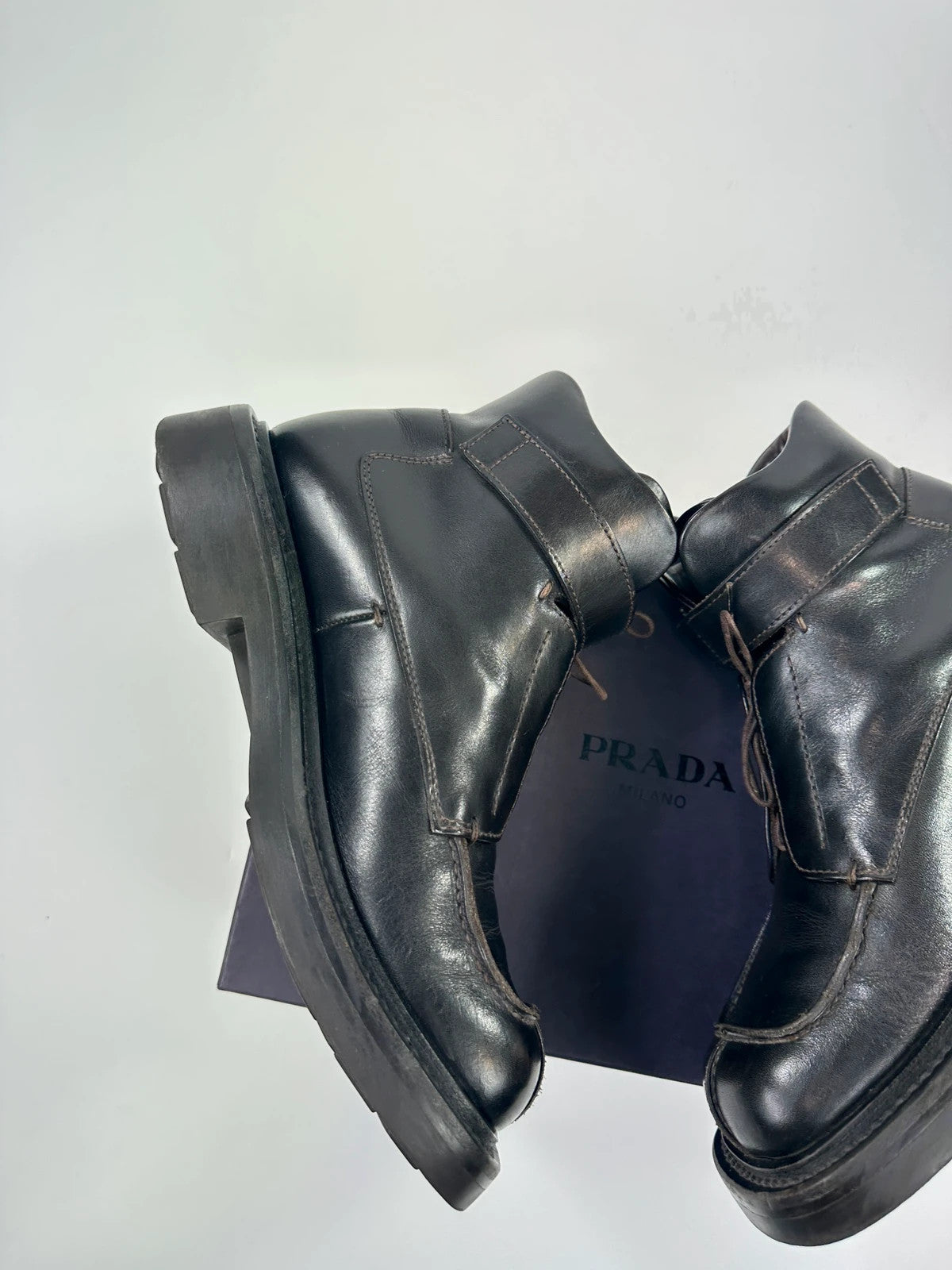 Prada black leather ankle boots with laces and Velcro, vintage 1999 collection.