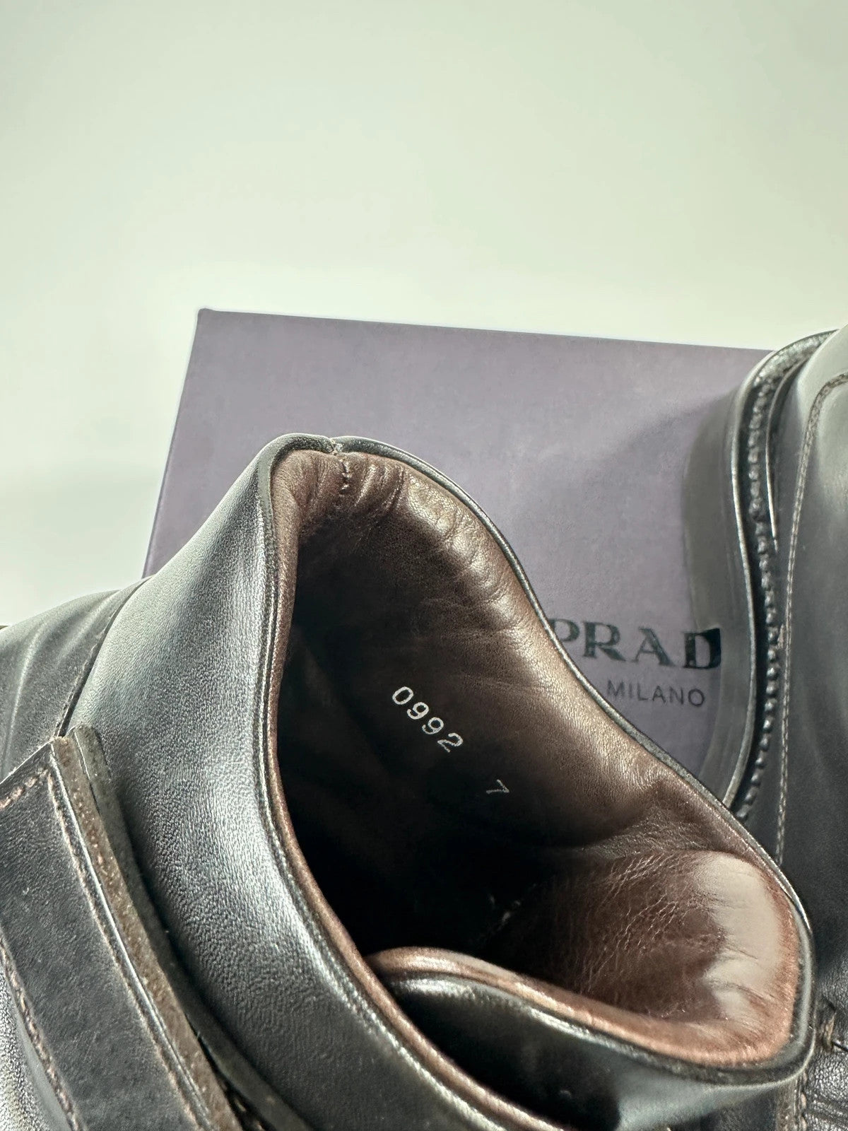 Prada black leather ankle boots with laces and Velcro, vintage 1999 collection.