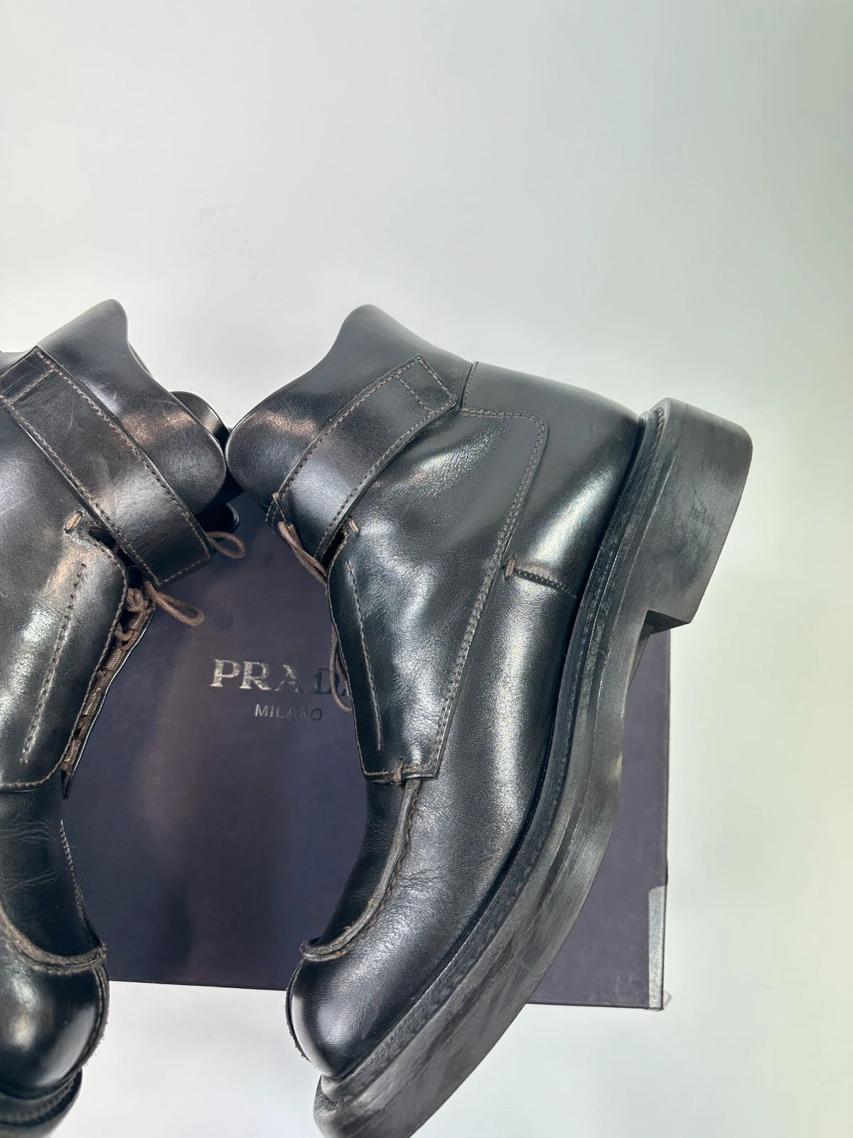 Prada black leather ankle boots with laces and Velcro, vintage 1999 collection.