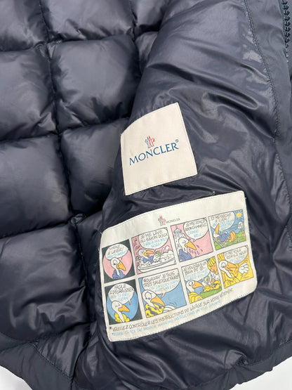 Moncler navy blue puffer jacket with diamond pattern, hood, and down filling.