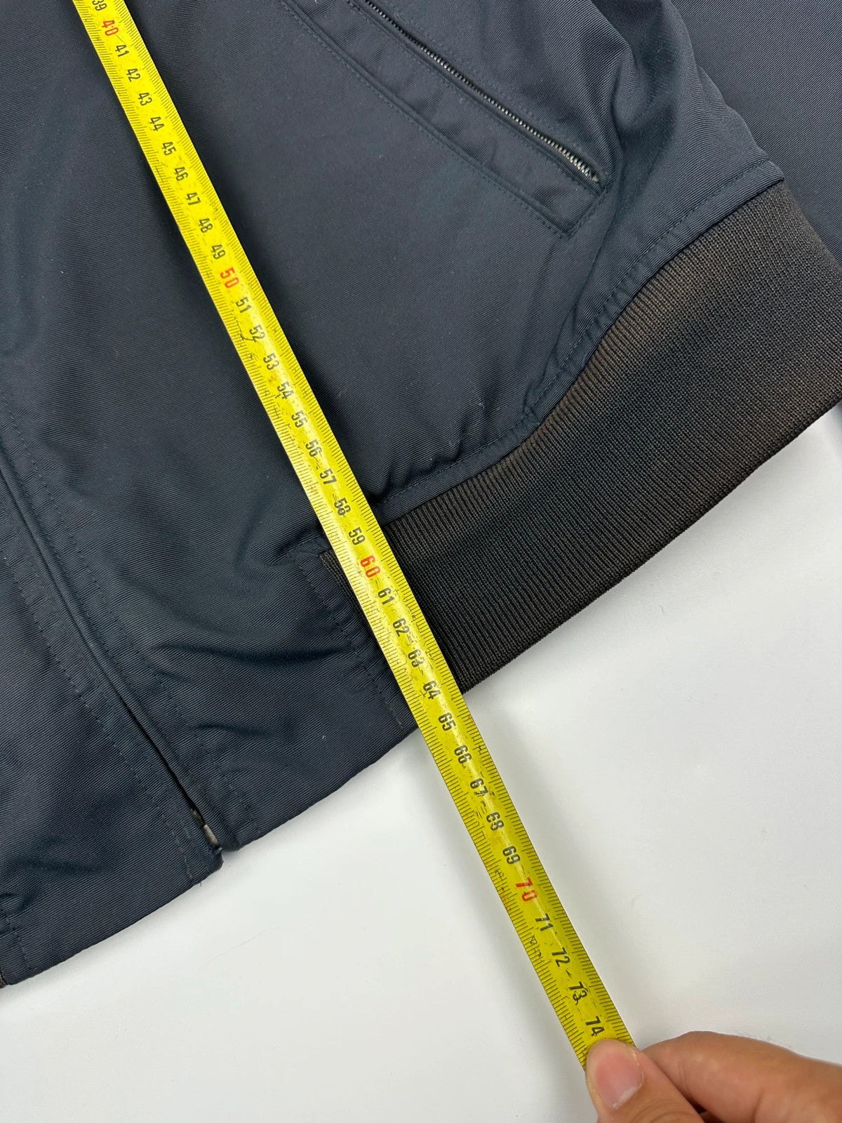 Gucci navy blue bomber jacket with suede inserts and vintage 2000s design.
