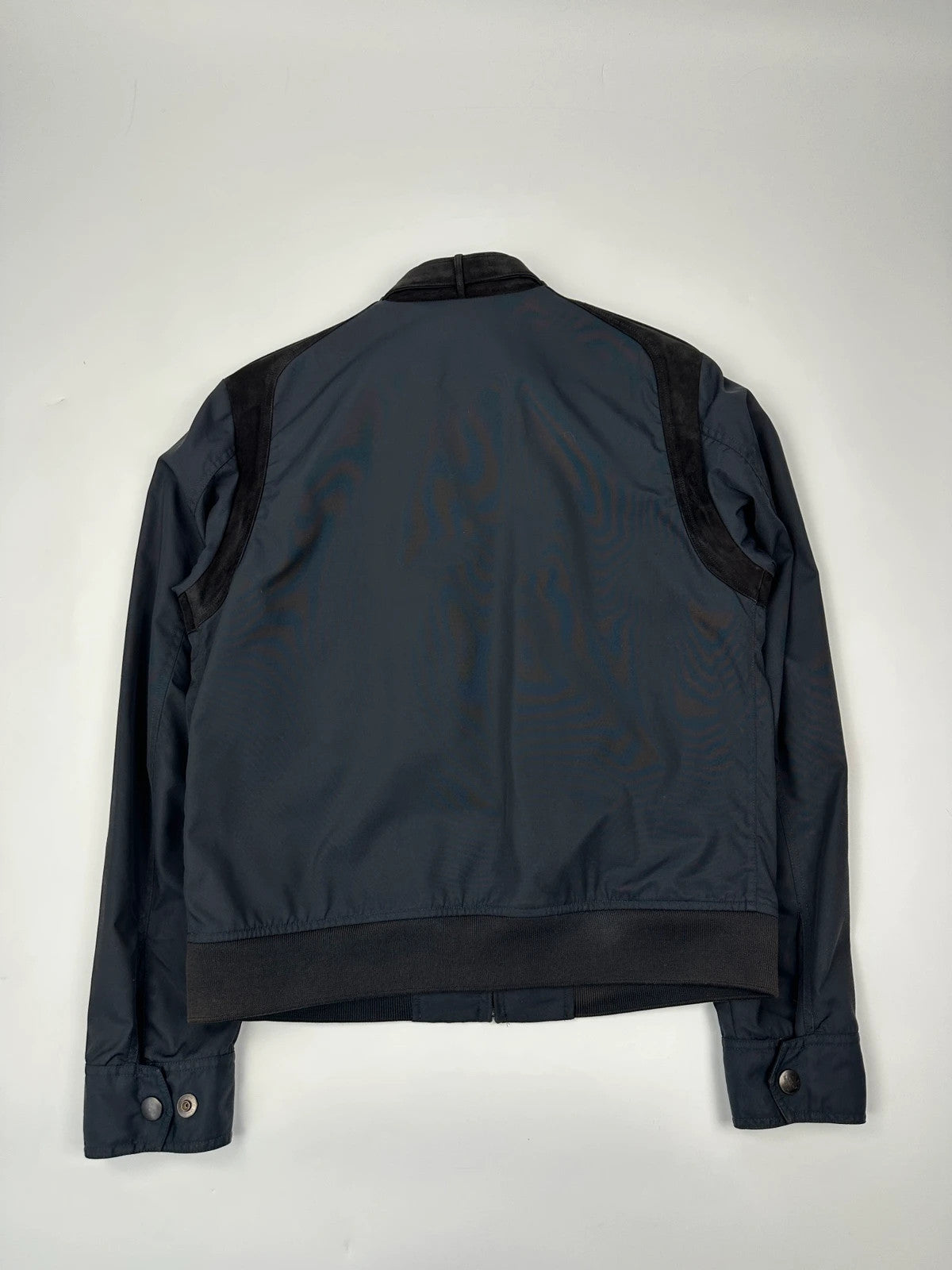 Gucci navy blue bomber jacket with suede inserts and vintage 2000s design.