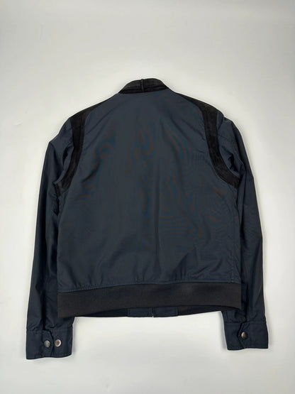 Gucci navy blue bomber jacket with suede inserts and vintage 2000s design.