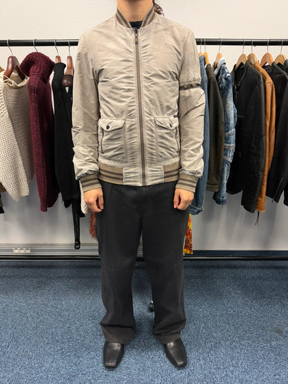 Dolce & Gabbana beige grey bomber jacket with faded nylon and logo details.