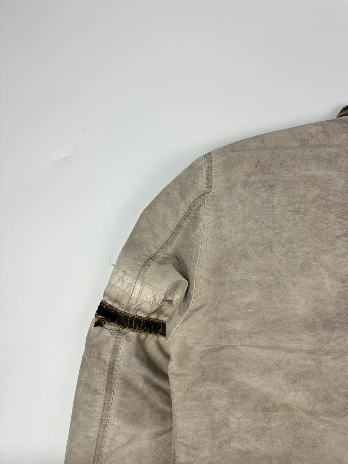 Dolce & Gabbana beige grey bomber jacket with faded nylon and logo details.