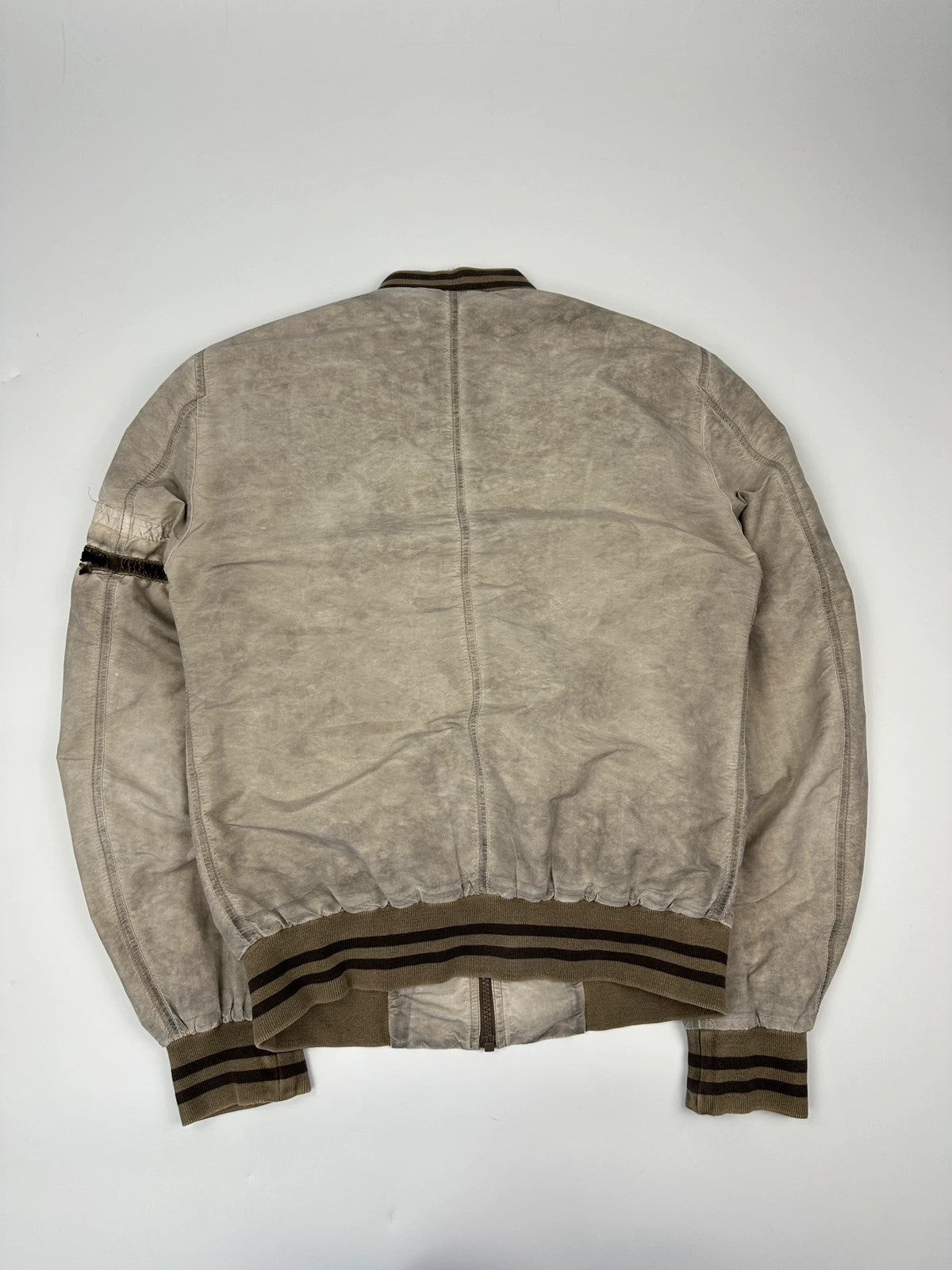 Dolce & Gabbana beige grey bomber jacket with faded nylon and logo details.