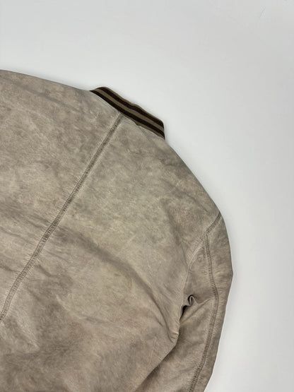Dolce & Gabbana beige grey bomber jacket with faded nylon and logo details.