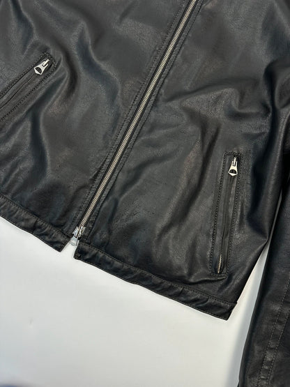 Armani Jeans black faux leather jacket with worn pockets and minimalist design.
