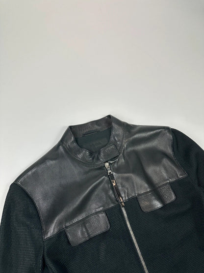 Prada black mesh and leather jacket with logo detailing and vintage design elements.