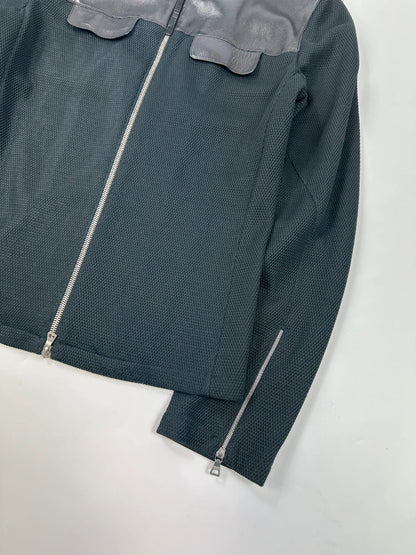 Prada black mesh and leather jacket with logo detailing and vintage design elements.