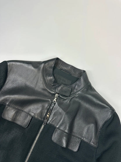 Prada black mesh and leather jacket with logo detailing and vintage design elements.