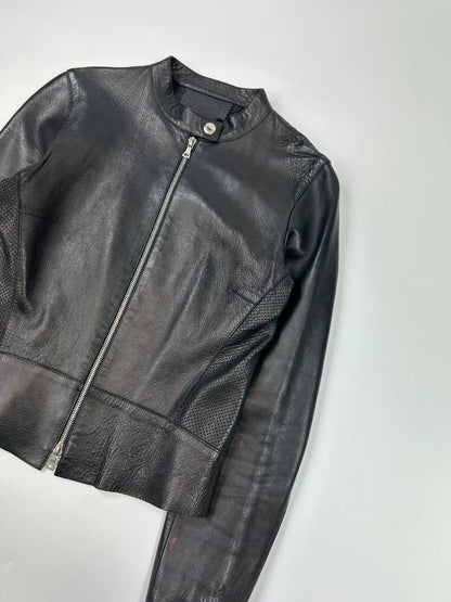 Prada black perforated leather jacket with subtle logo detailing and minimalist design.