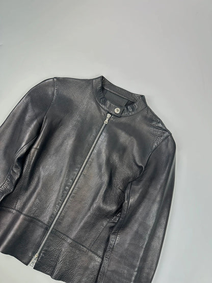 Prada black perforated leather jacket with subtle logo detailing and minimalist design.
