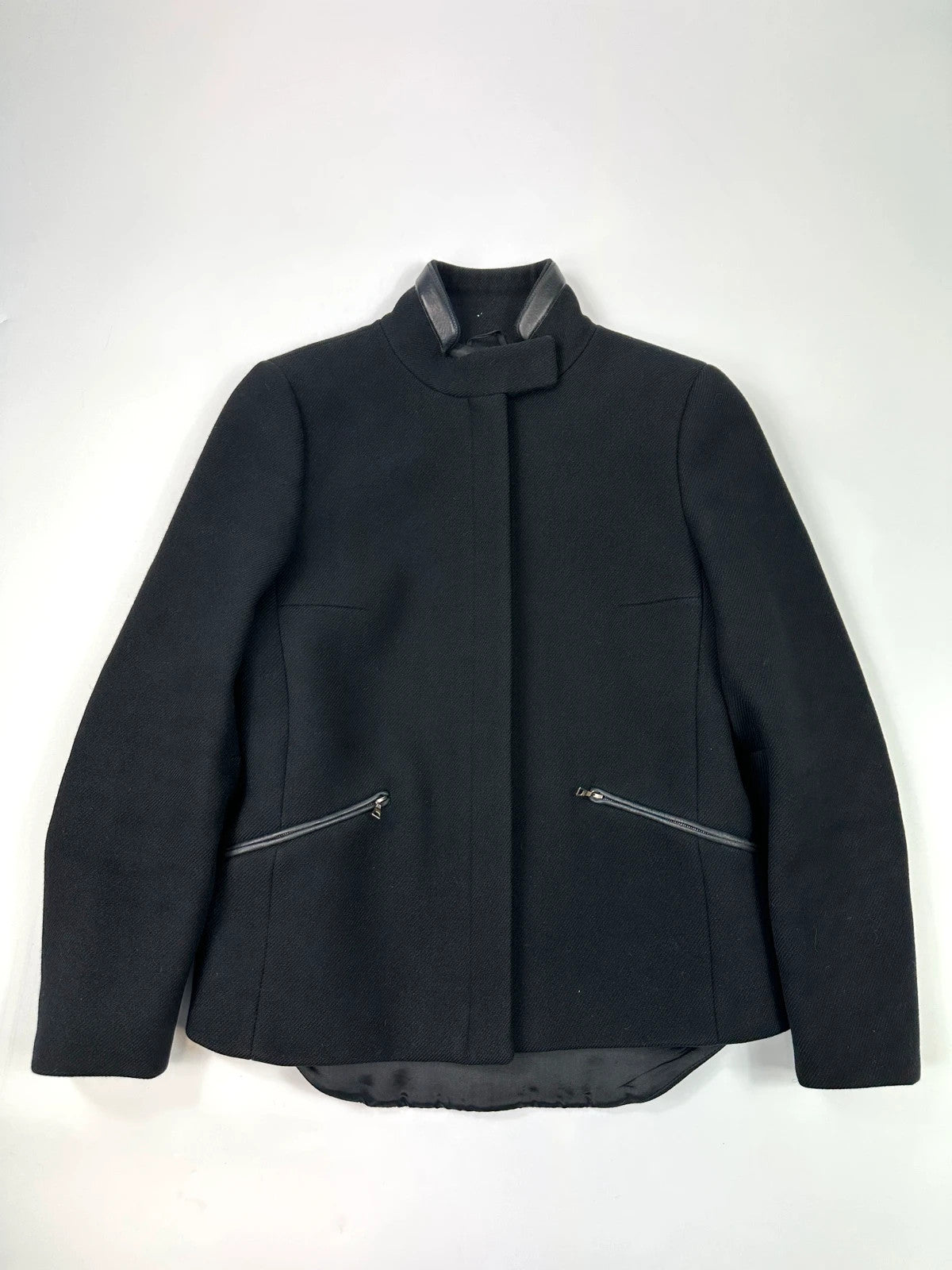Prada black wool and leather jacket with biker-style detailing and logo accents.