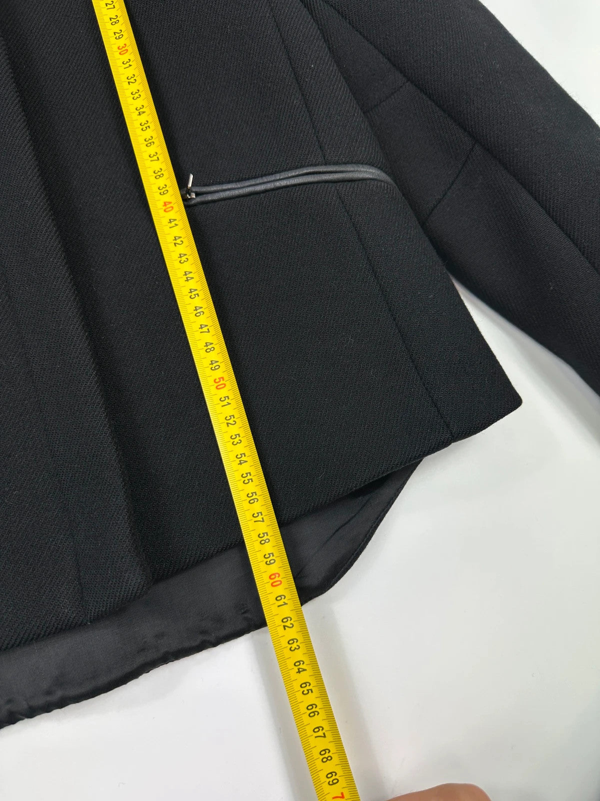 Prada black wool and leather jacket with biker-style detailing and logo accents.