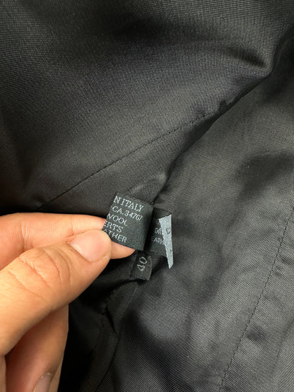 Prada black wool and leather jacket with biker-style detailing and logo accents.