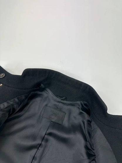 Prada black wool and leather jacket with biker-style detailing and logo accents.