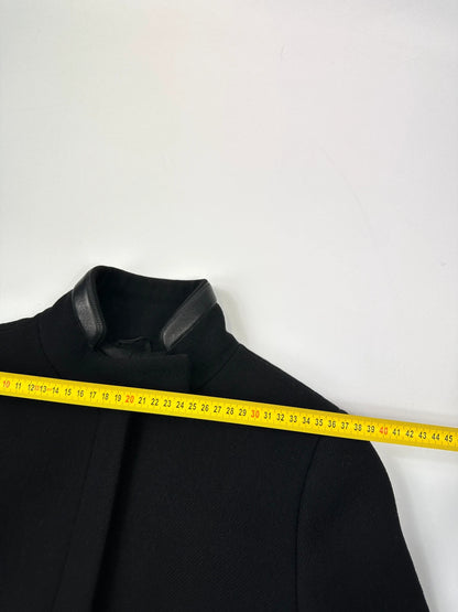 Prada black wool and leather jacket with biker-style detailing and logo accents.