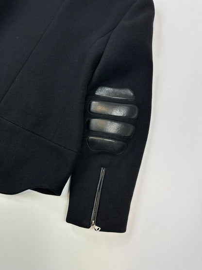 Prada black wool and leather jacket with biker-style detailing and logo accents.