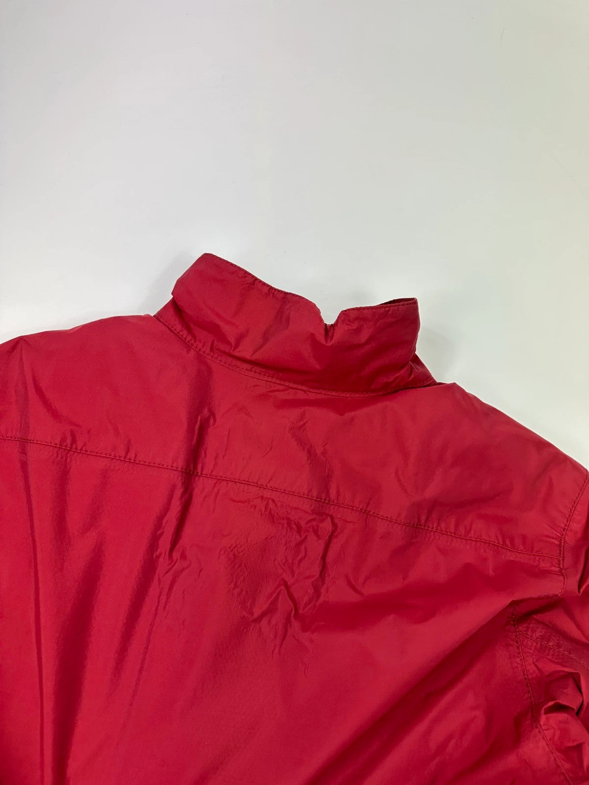 Prada red Gore-Tex jacket with logo detail, vintage Autumn-Winter 2003 collection.