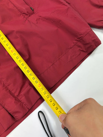 Prada red Gore-Tex jacket with logo detail, vintage Autumn-Winter 2003 collection.