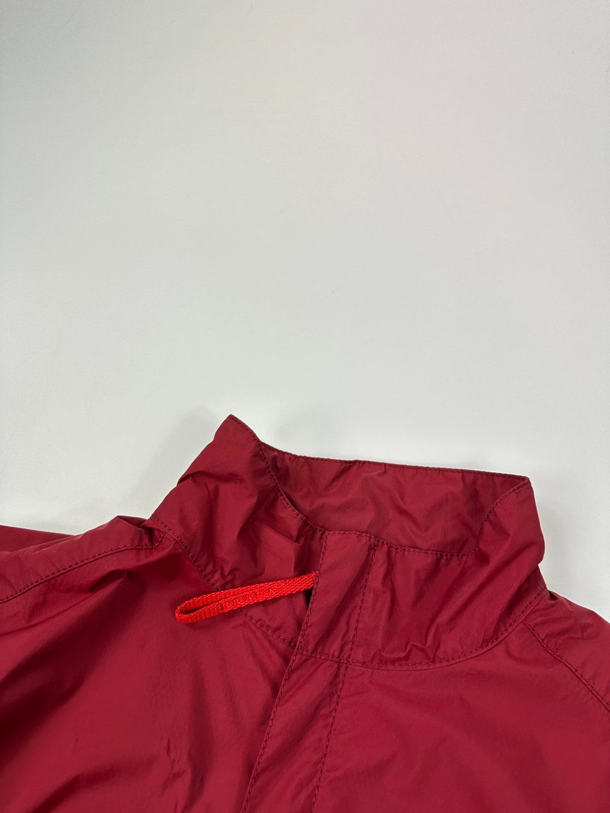 Prada red Gore-Tex jacket with logo detail, vintage Autumn-Winter 2003 collection.