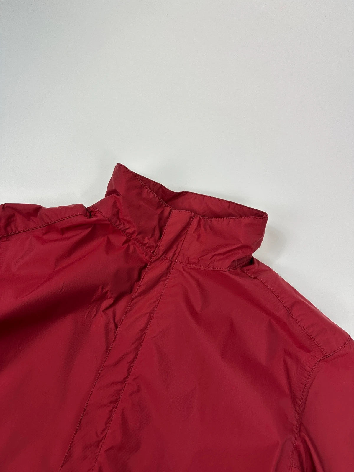 Prada red Gore-Tex jacket with logo detail, vintage Autumn-Winter 2003 collection.