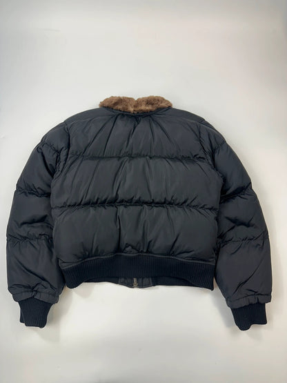 Prada black cropped bomber puffer jacket with logo detailing and vintage 90s design.