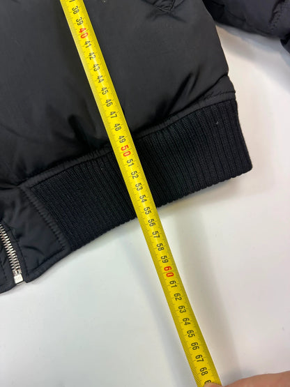 Prada black cropped bomber puffer jacket with logo detailing and vintage 90s design.
