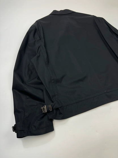 Hermès brown and navy jacket with leather straps and buttons, vintage 2000s design.