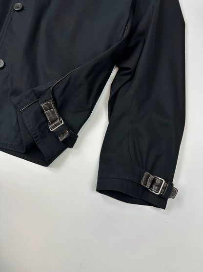 Hermès brown and navy jacket with leather straps and buttons, vintage 2000s design.