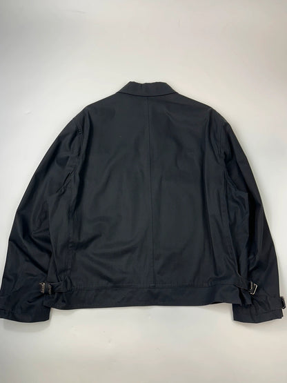 Hermès brown and navy jacket with leather straps and buttons, vintage 2000s design.